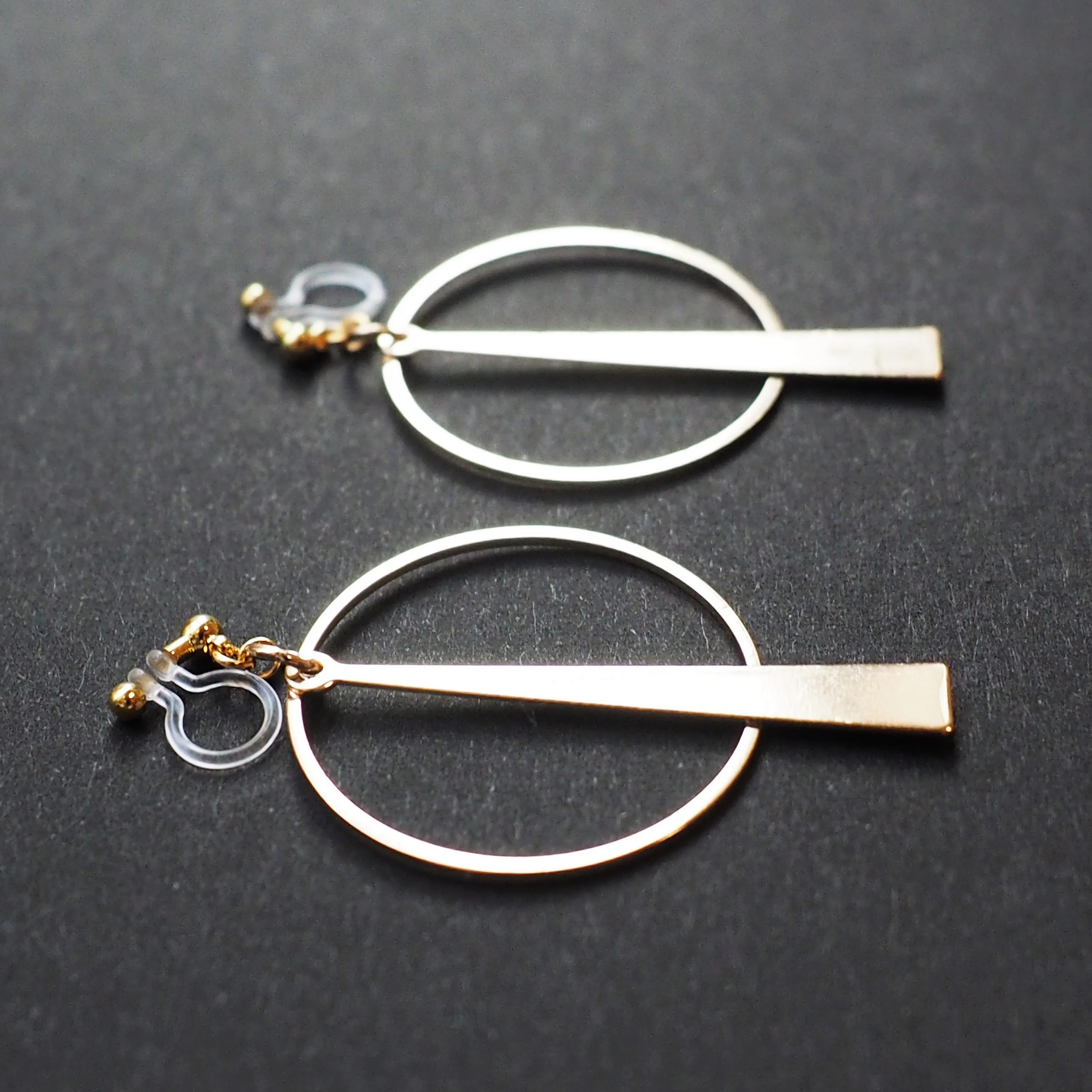 Geometric gold hoop invisible clip on earrings