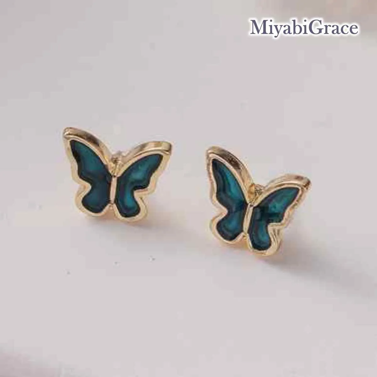 Green / White Butterfly Invisible Clip On Earrings