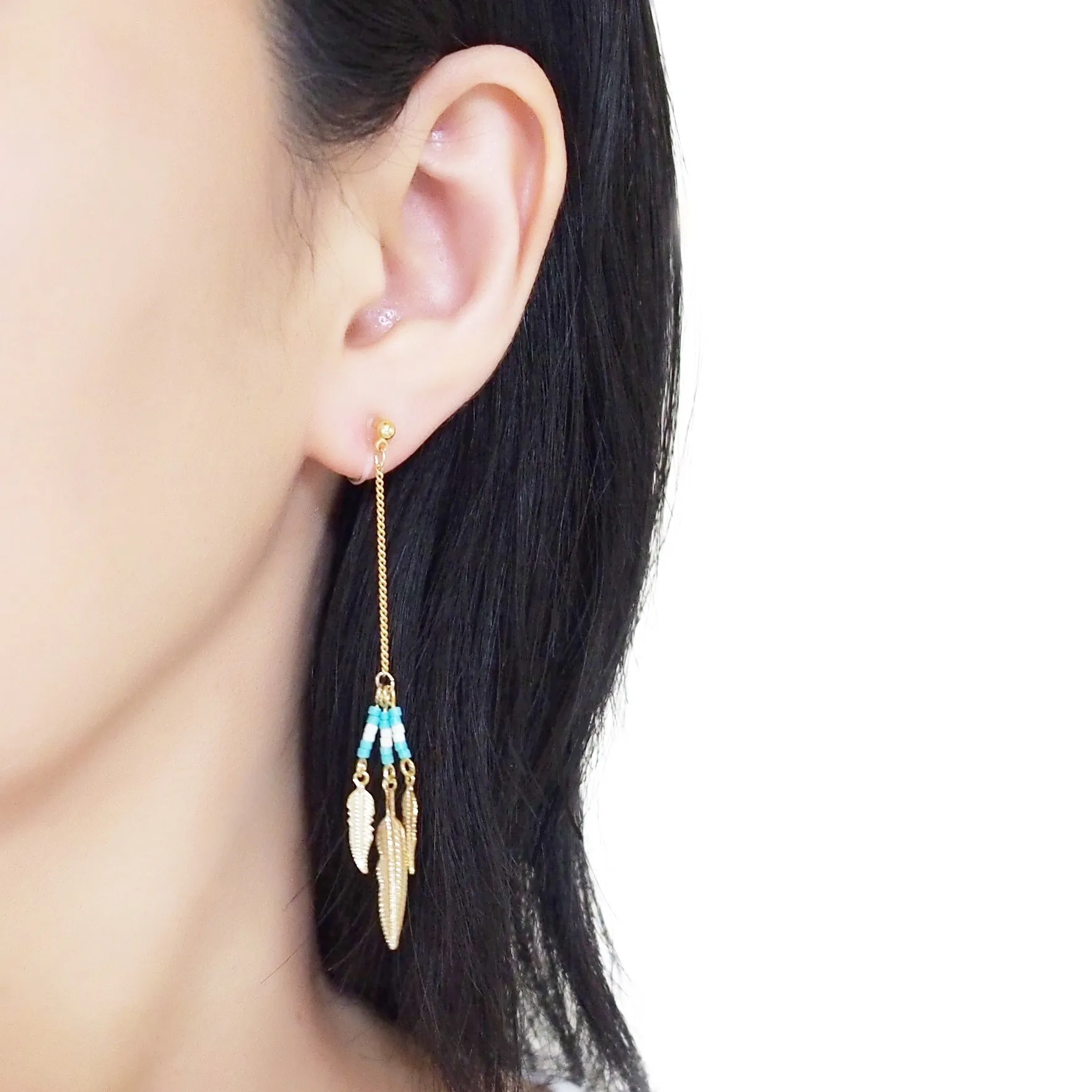 Long feather motif invisible clip on earrings ( Gold tone )