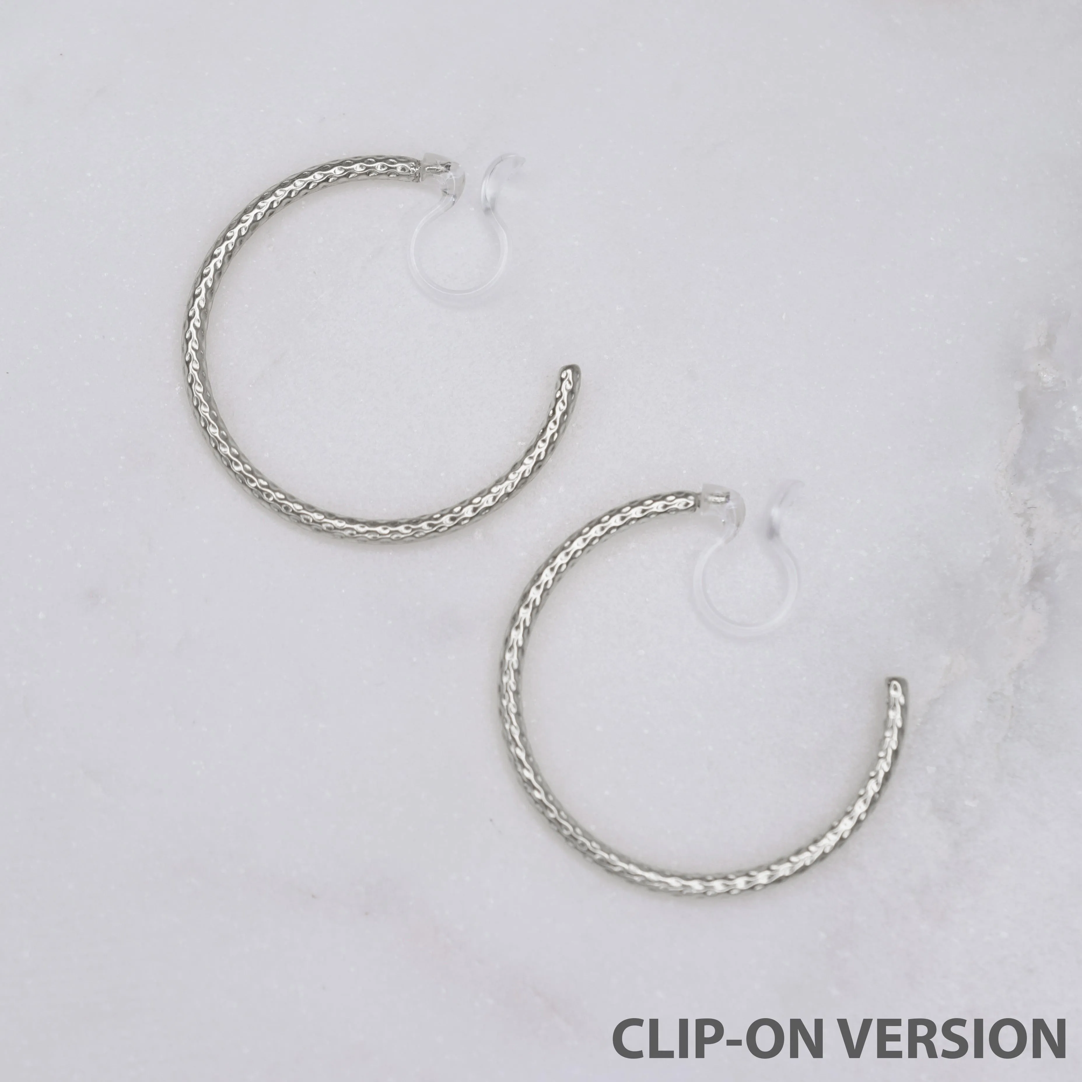 MEDIUM TEXTURED HOOP CLIP-ON EARRINGS IN SILVER